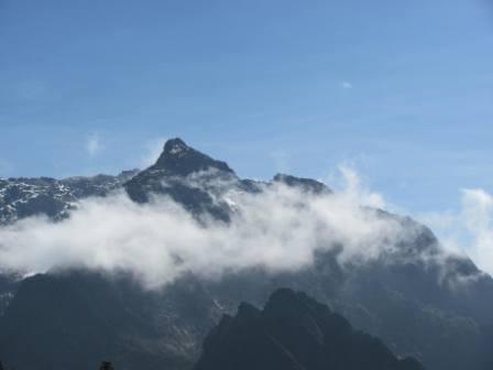 Rwenzori is the highest mountain range in Africa with the highest peaks; Margherita (5,109m) and Alexandra (5083m) on Mount Stanley. These are exceeded in altitude elsewhere in Africa only by Mt. Kilimanjaro and Mt. Kenya which are extinct volcanoes standing in isolation above the surrounding plain